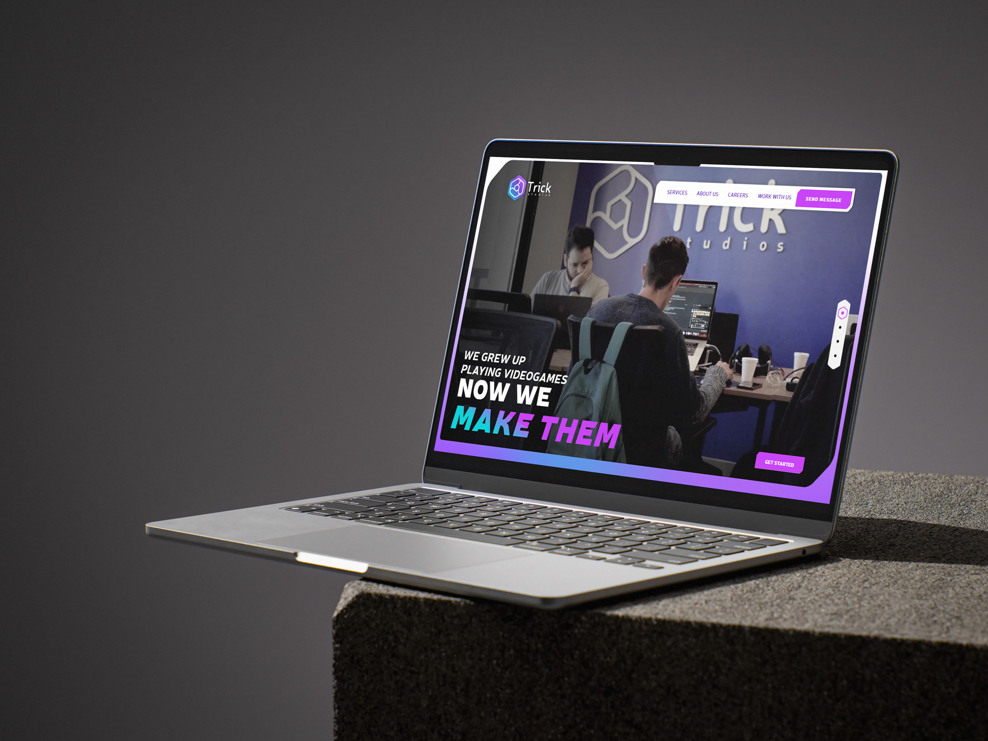 Trick Studios website hero displayed on a laptop